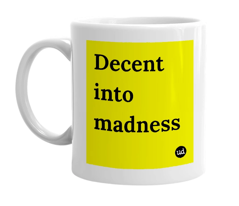 White mug with 'Decent into madness' in bold black letters
