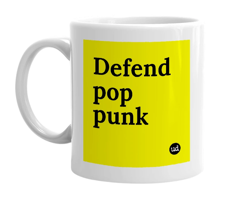 White mug with 'Defend pop punk' in bold black letters