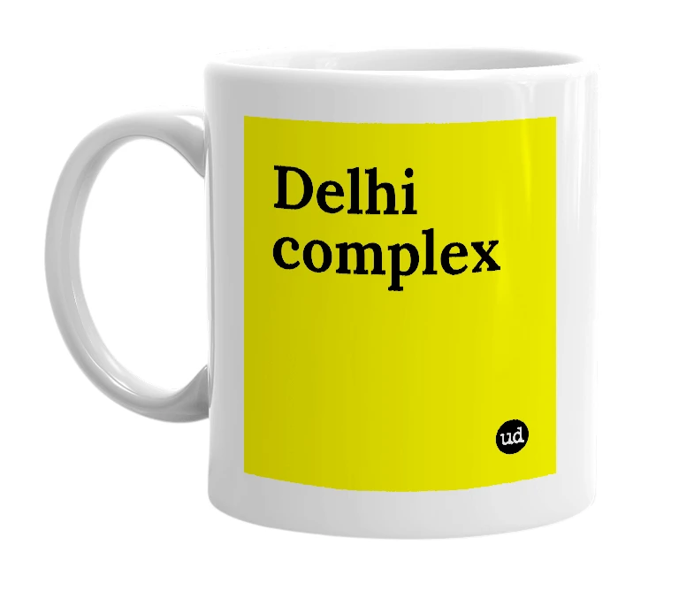 White mug with 'Delhi complex' in bold black letters
