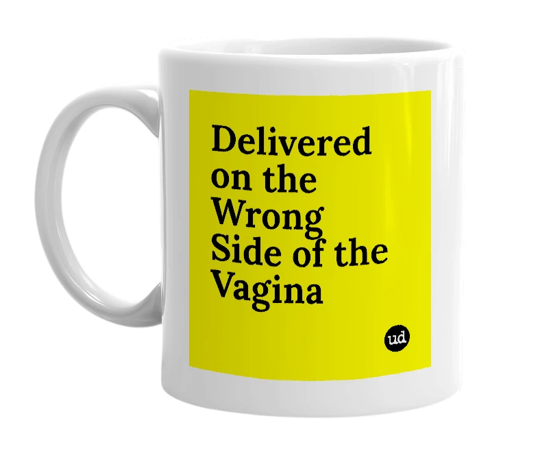 White mug with 'Delivered on the Wrong Side of the Vagina' in bold black letters