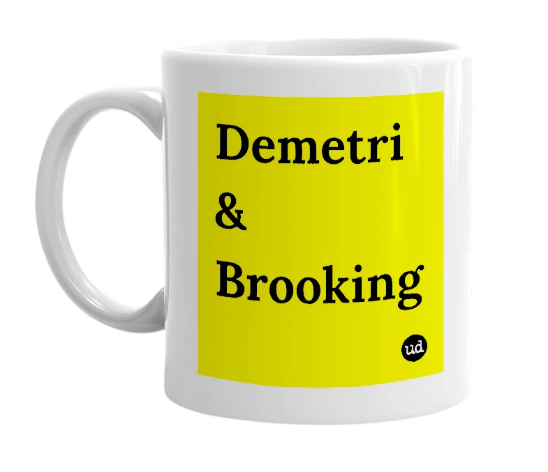 White mug with 'Demetri & Brooking' in bold black letters