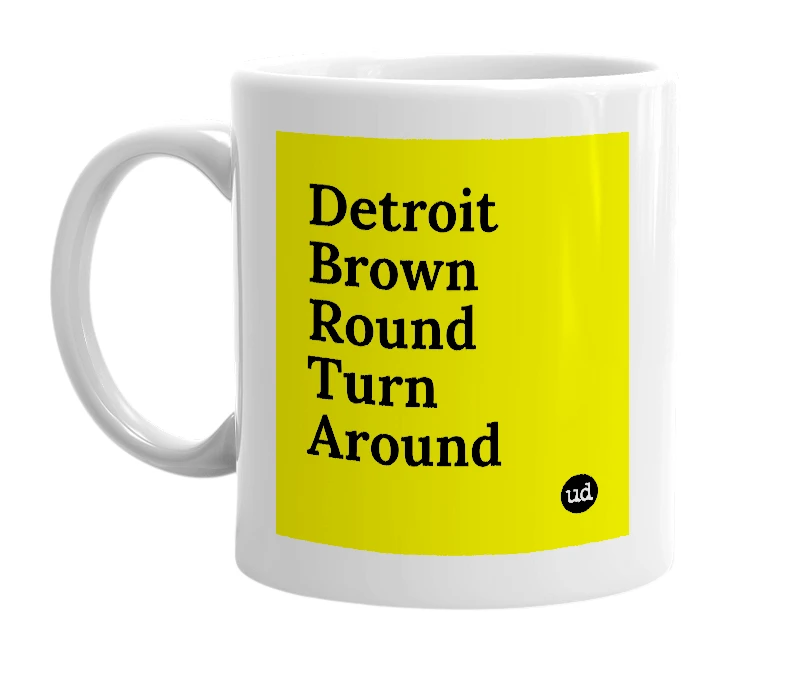 White mug with 'Detroit Brown Round Turn Around' in bold black letters