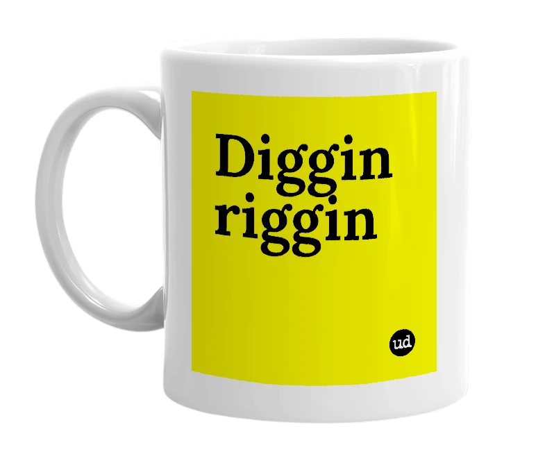 White mug with 'Diggin riggin' in bold black letters