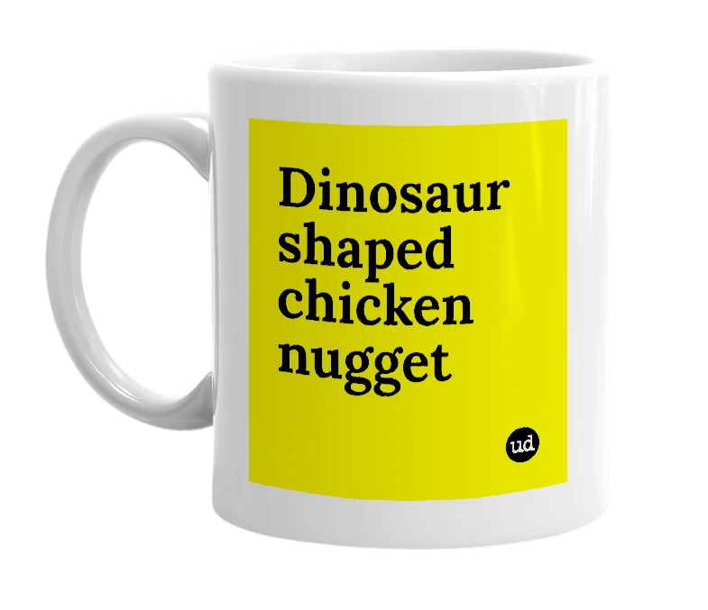 White mug with 'Dinosaur shaped chicken nugget' in bold black letters