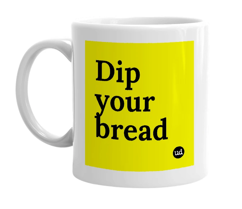 White mug with 'Dip your bread' in bold black letters