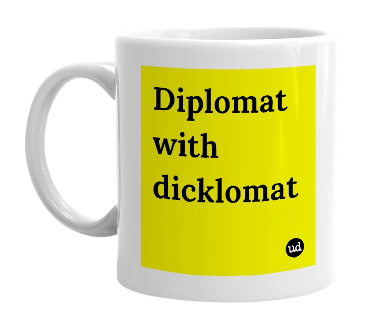 White mug with 'Diplomat with dicklomat' in bold black letters