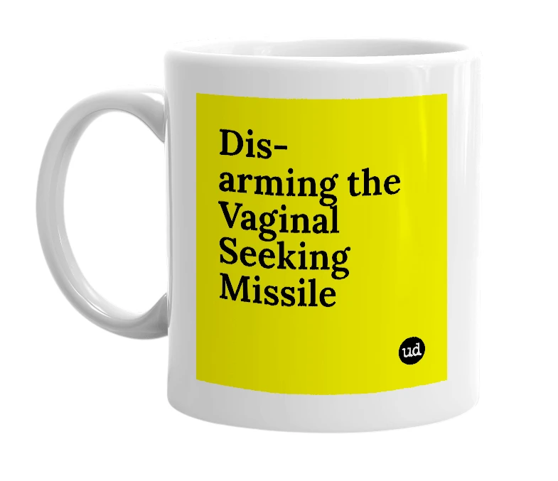 White mug with 'Dis-arming the Vaginal Seeking Missile' in bold black letters