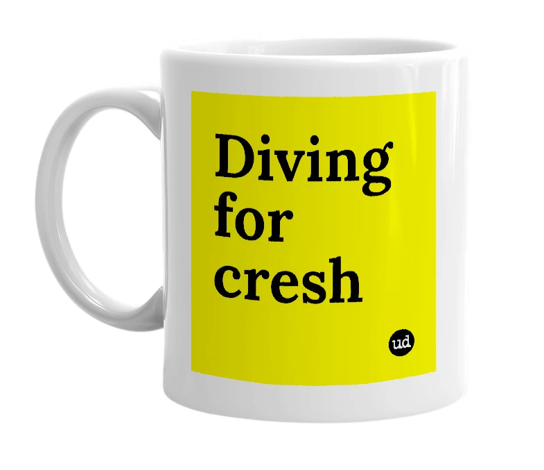 White mug with 'Diving for cresh' in bold black letters