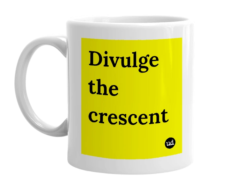 White mug with 'Divulge the crescent' in bold black letters