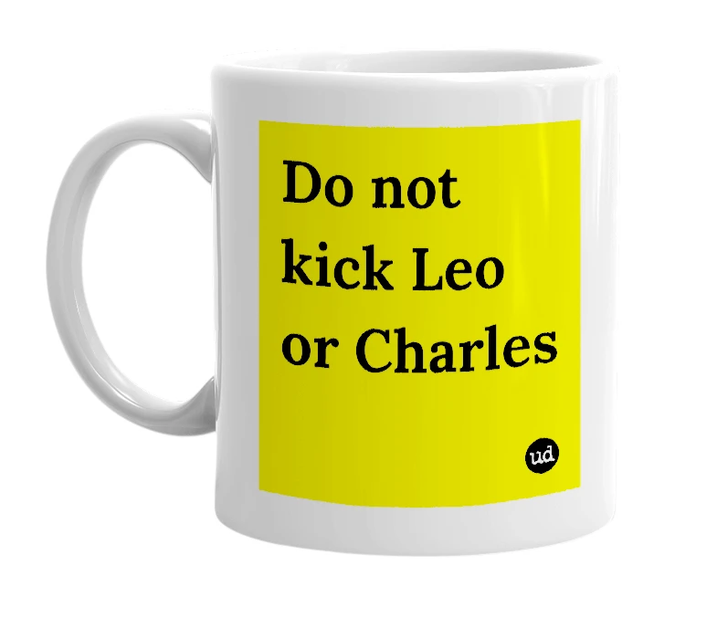 White mug with 'Do not kick Leo or Charles' in bold black letters