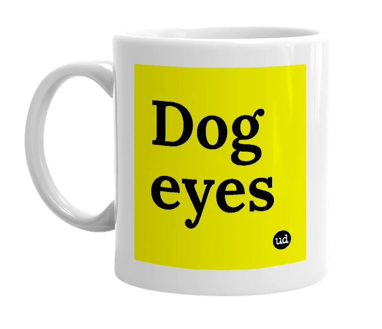 White mug with 'Dog eyes' in bold black letters