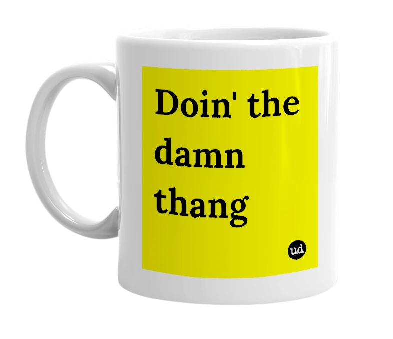 White mug with 'Doin' the damn thang' in bold black letters