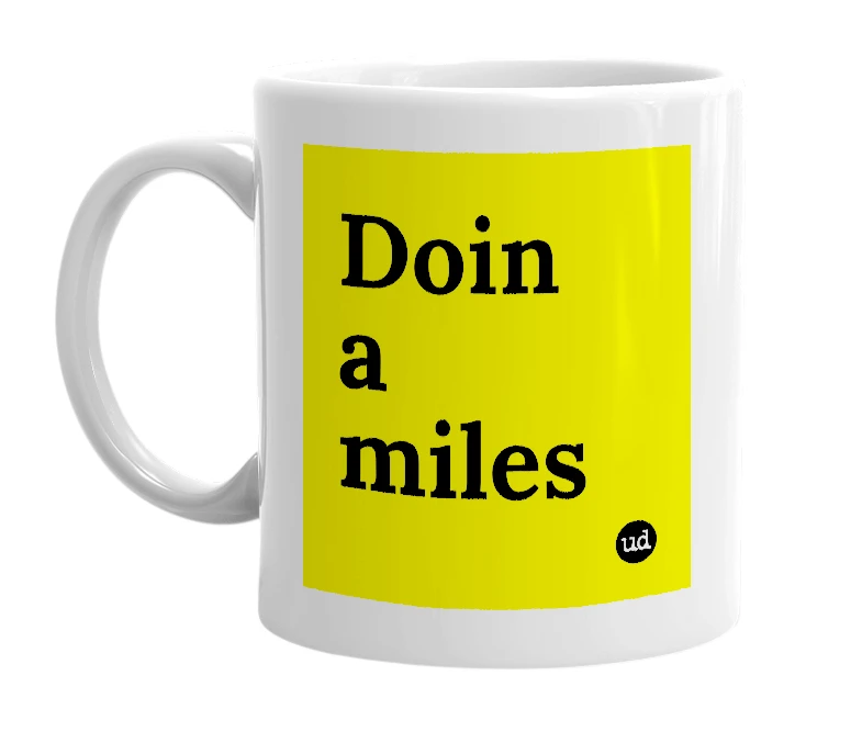 White mug with 'Doin a miles' in bold black letters