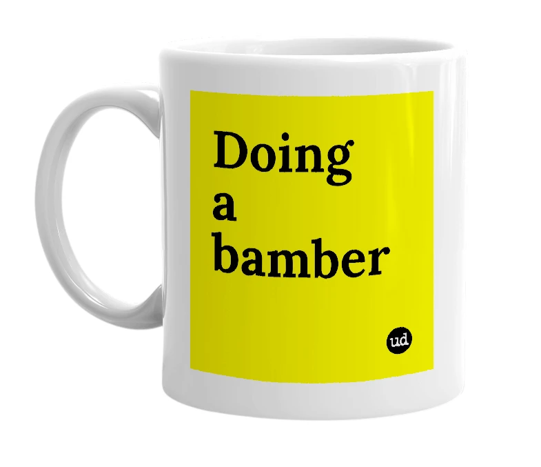 White mug with 'Doing a bamber' in bold black letters
