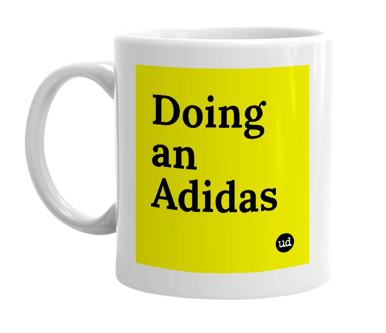 White mug with 'Doing an Adidas' in bold black letters