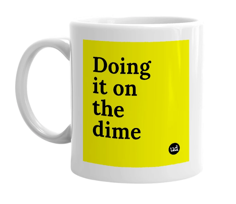 White mug with 'Doing it on the dime' in bold black letters