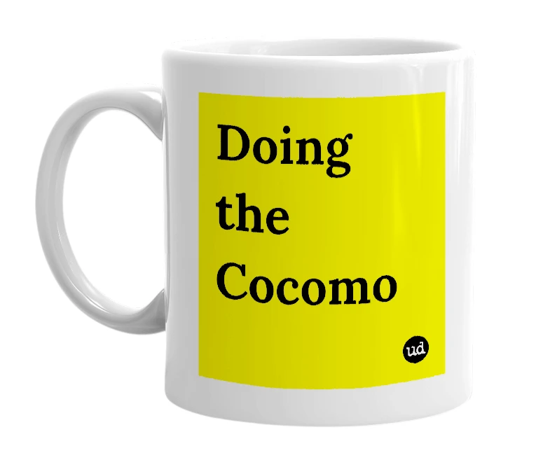 White mug with 'Doing the Cocomo' in bold black letters