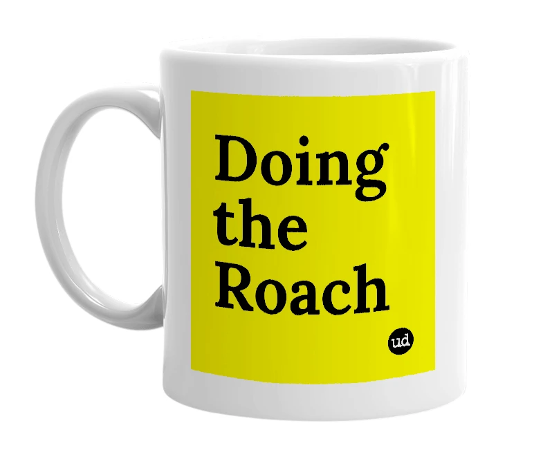 White mug with 'Doing the Roach' in bold black letters