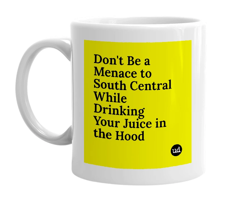 White mug with 'Don't Be a Menace to South Central While Drinking Your Juice in the Hood' in bold black letters