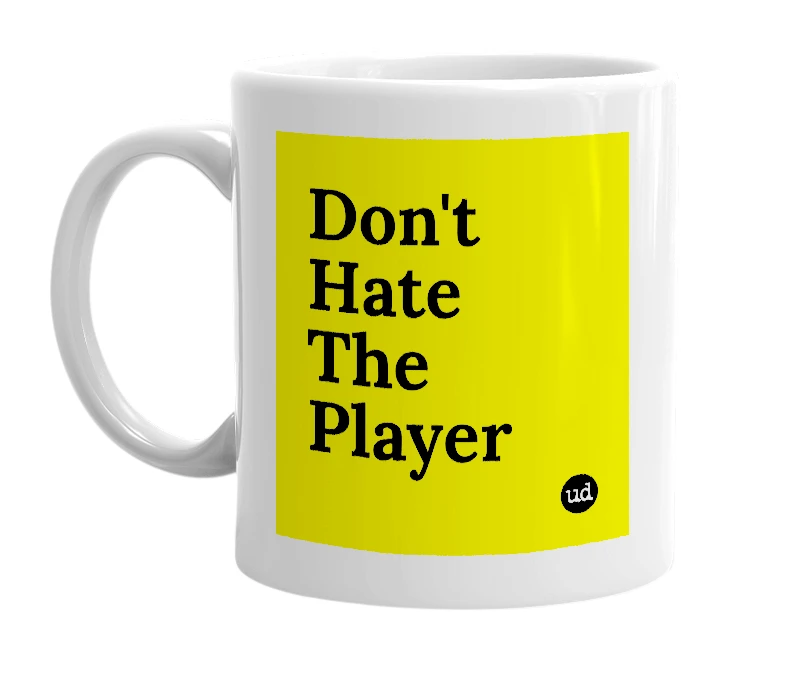 White mug with 'Don't Hate The Player' in bold black letters