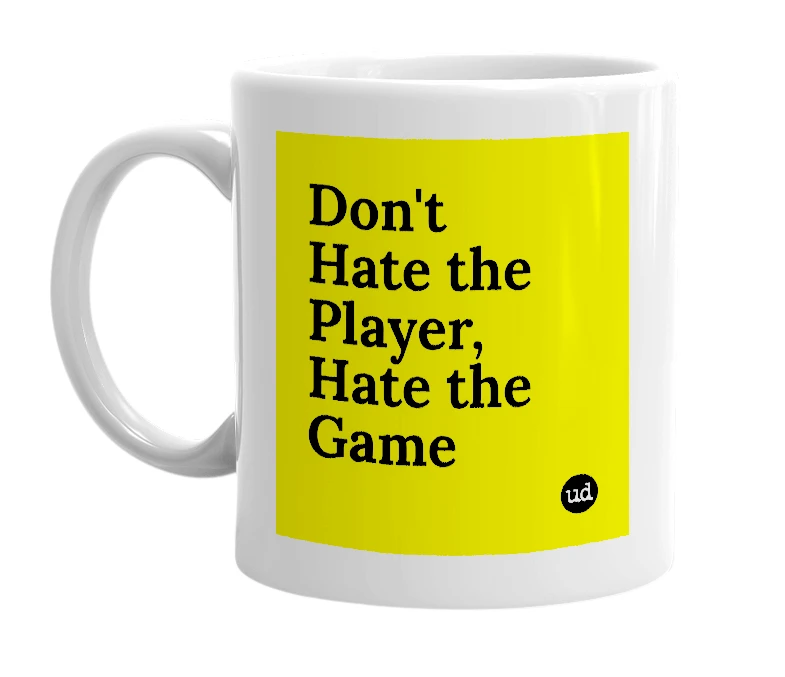 White mug with 'Don't Hate the Player, Hate the Game' in bold black letters