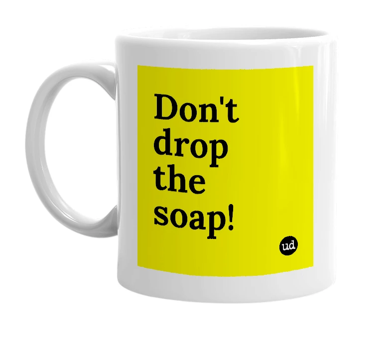 White mug with 'Don't drop the soap!' in bold black letters