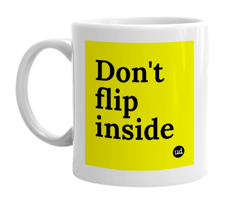 White mug with 'Don't flip inside' in bold black letters