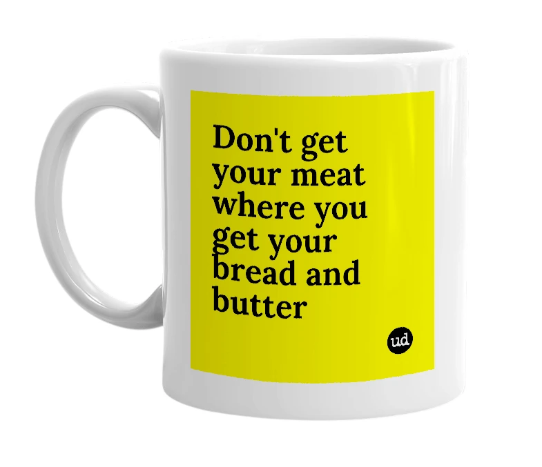 White mug with 'Don't get your meat where you get your bread and butter' in bold black letters