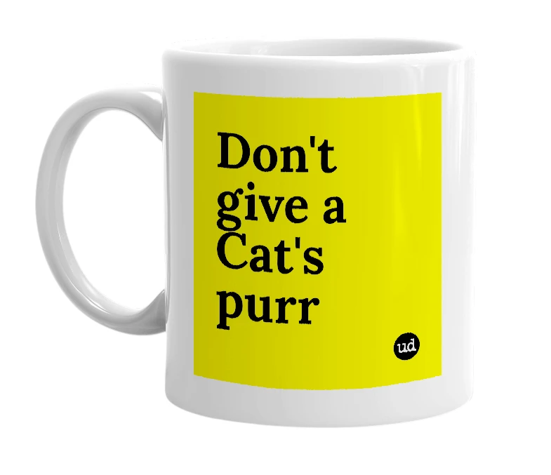 White mug with 'Don't give a Cat's purr' in bold black letters