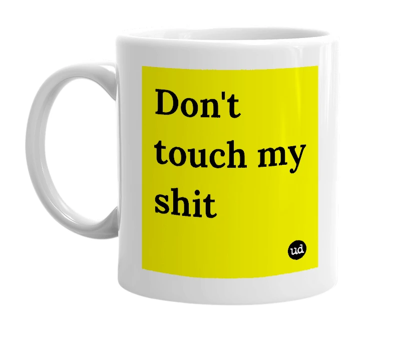 White mug with 'Don't touch my shit' in bold black letters