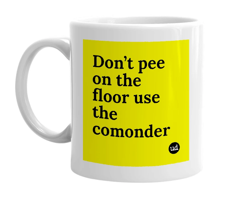 White mug with 'Don’t pee on the floor use the comonder' in bold black letters