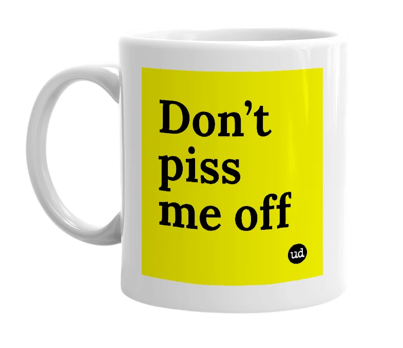 White mug with 'Don’t piss me off' in bold black letters