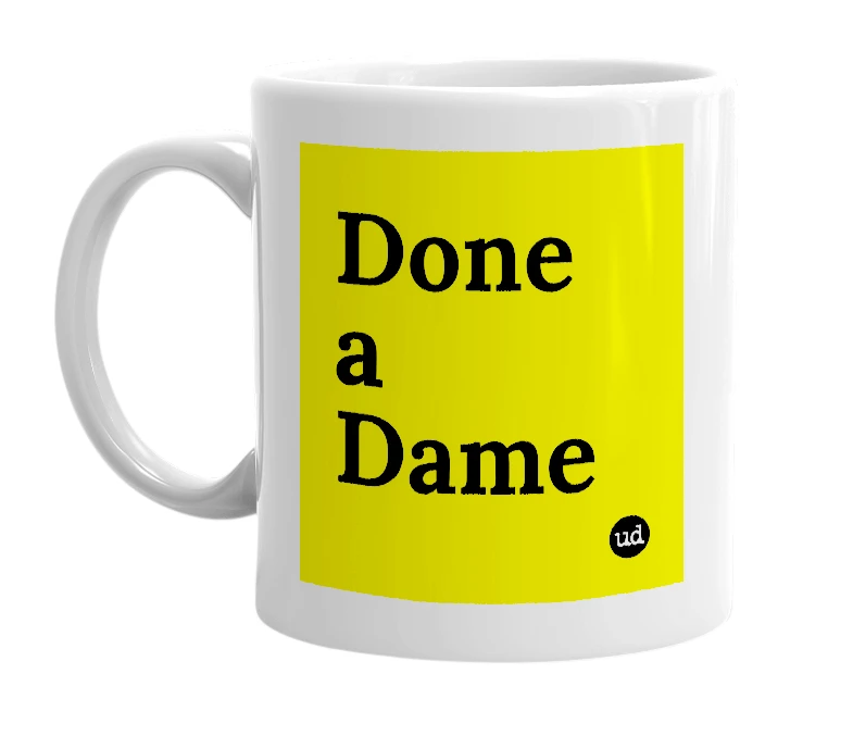 White mug with 'Done a Dame' in bold black letters