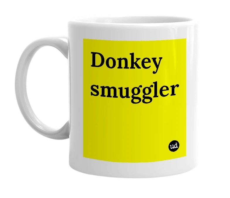 White mug with 'Donkey smuggler' in bold black letters
