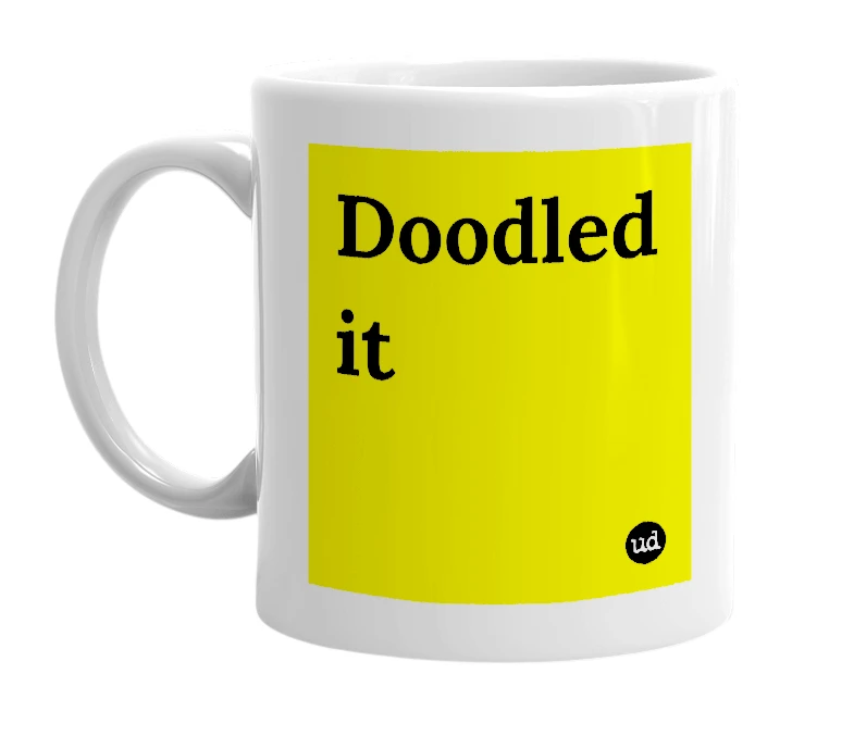 White mug with 'Doodled it' in bold black letters