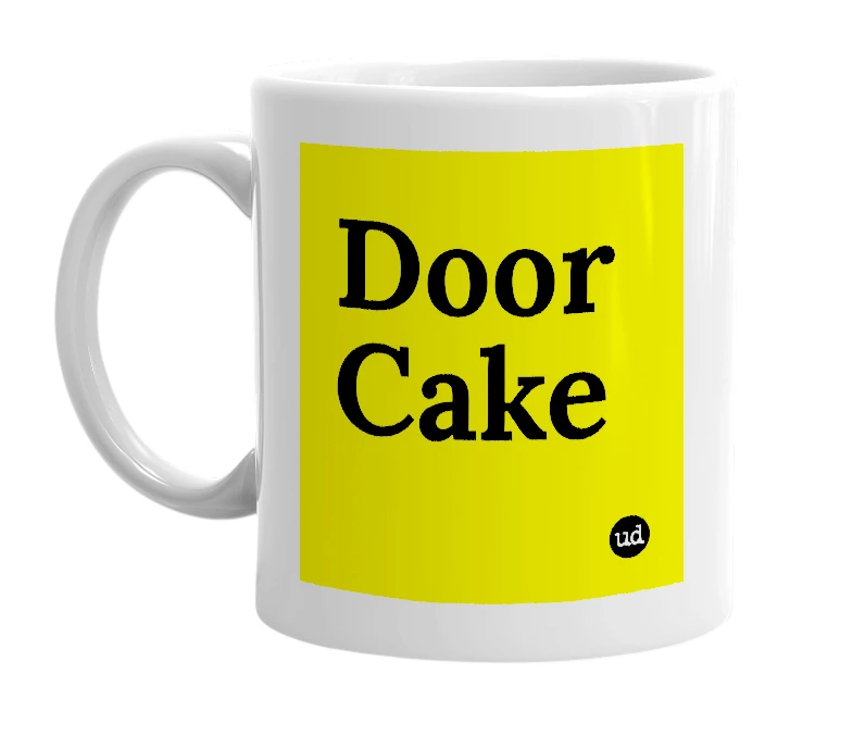 White mug with 'Door Cake' in bold black letters