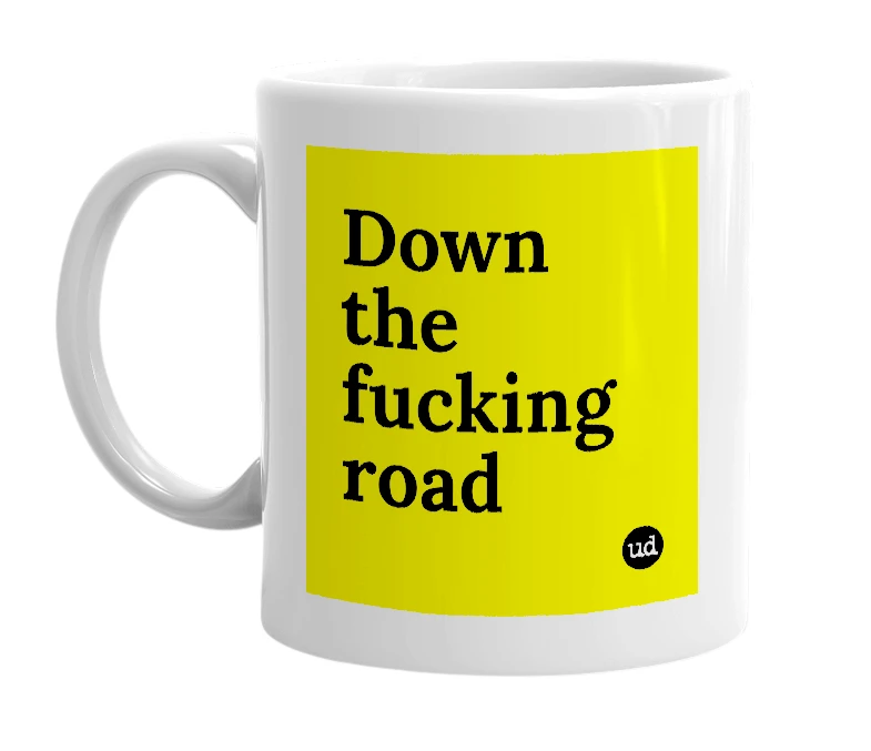 White mug with 'Down the fucking road' in bold black letters
