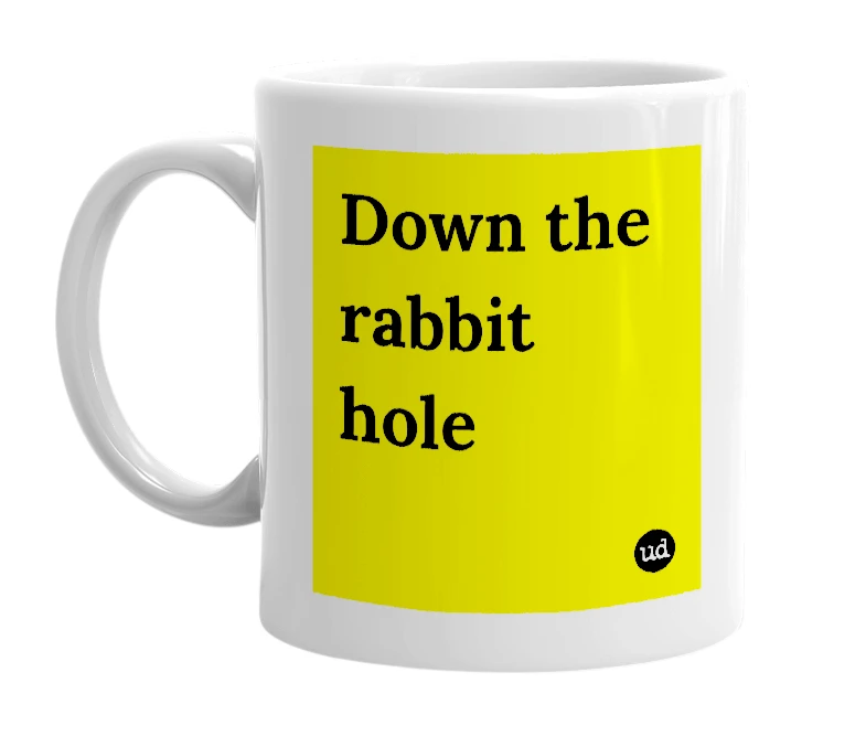 White mug with 'Down the rabbit hole' in bold black letters