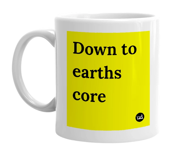 White mug with 'Down to earths core' in bold black letters