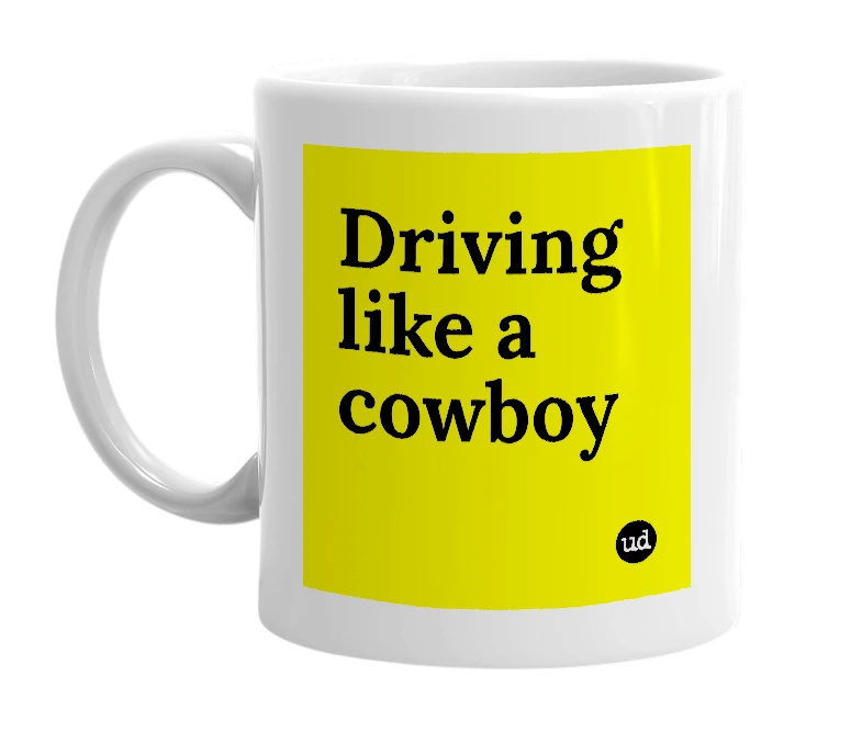 White mug with 'Driving like a cowboy' in bold black letters