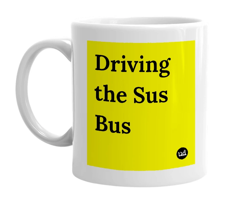 White mug with 'Driving the Sus Bus' in bold black letters