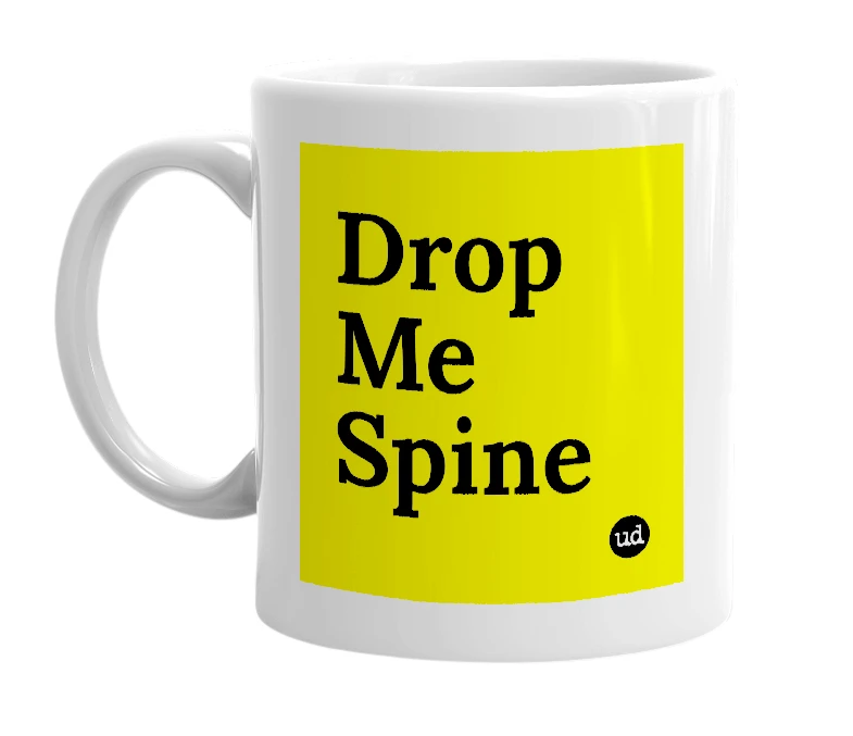White mug with 'Drop Me Spine' in bold black letters