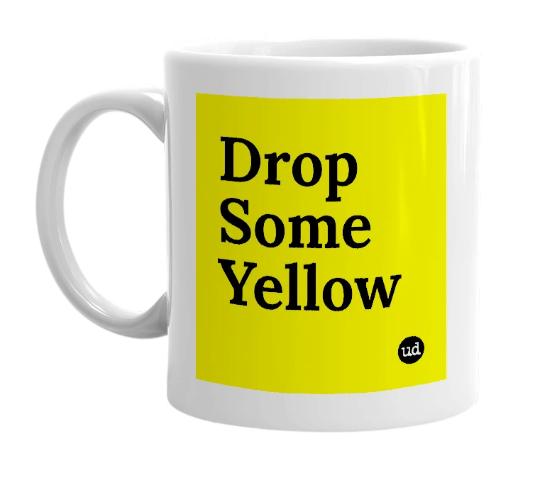 White mug with 'Drop Some Yellow' in bold black letters