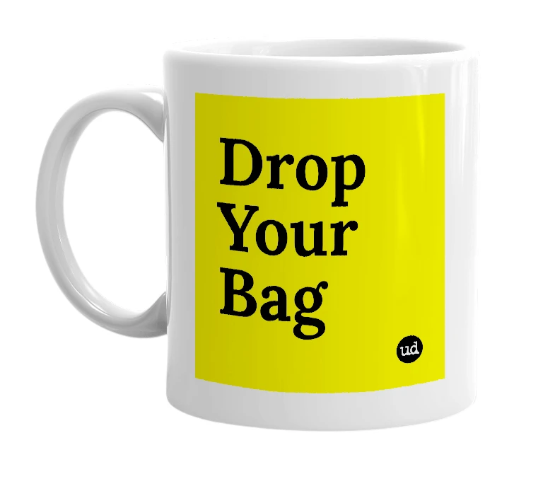 White mug with 'Drop Your Bag' in bold black letters