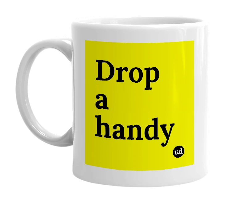 White mug with 'Drop a handy' in bold black letters