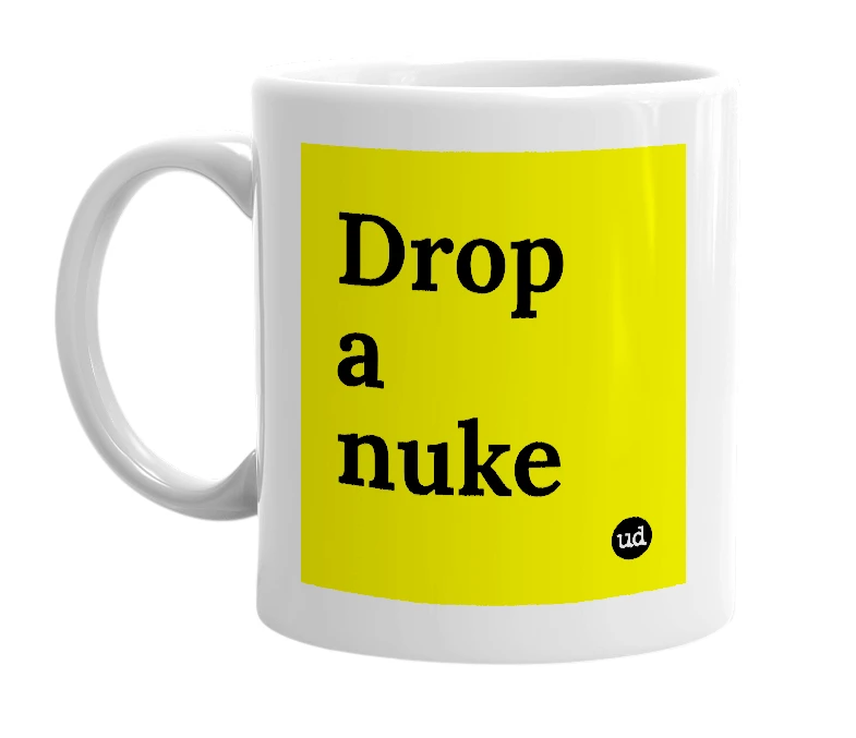 White mug with 'Drop a nuke' in bold black letters