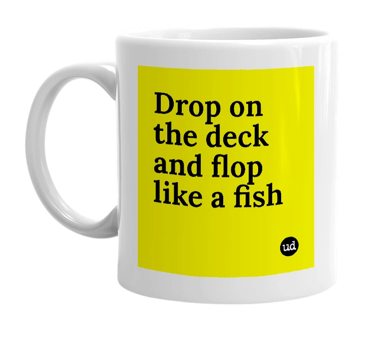 White mug with 'Drop on the deck and flop like a fish' in bold black letters