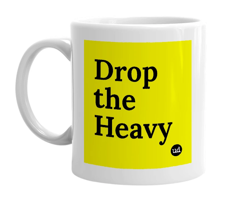 White mug with 'Drop the Heavy' in bold black letters