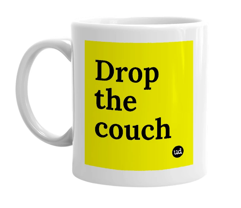 White mug with 'Drop the couch' in bold black letters