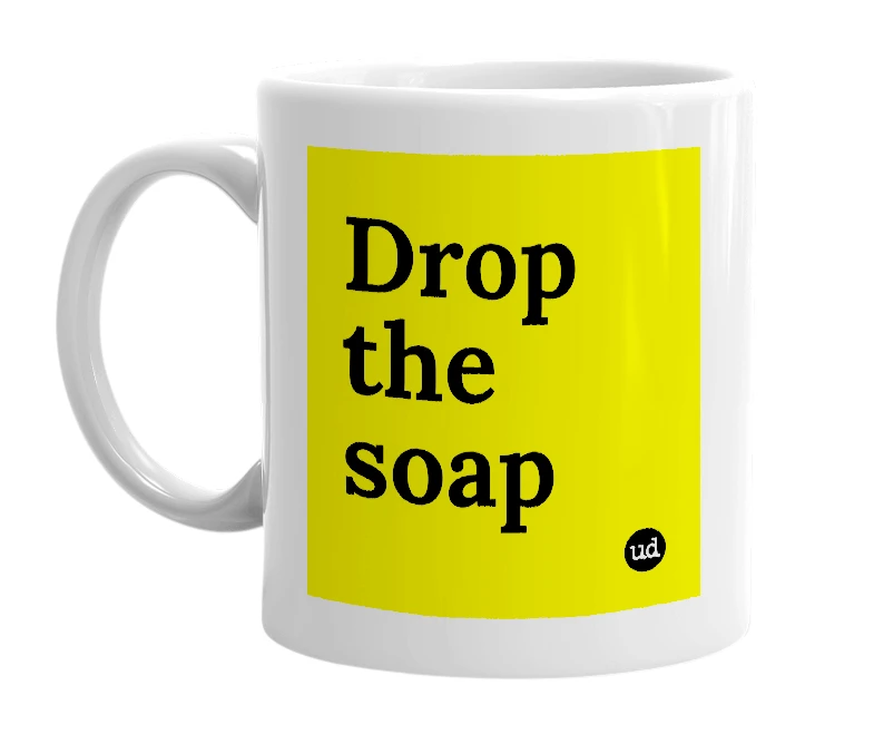 White mug with 'Drop the soap' in bold black letters